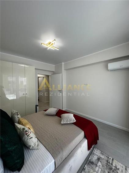 Apartament cu 3 camere semidecomandat, mobilat în Central