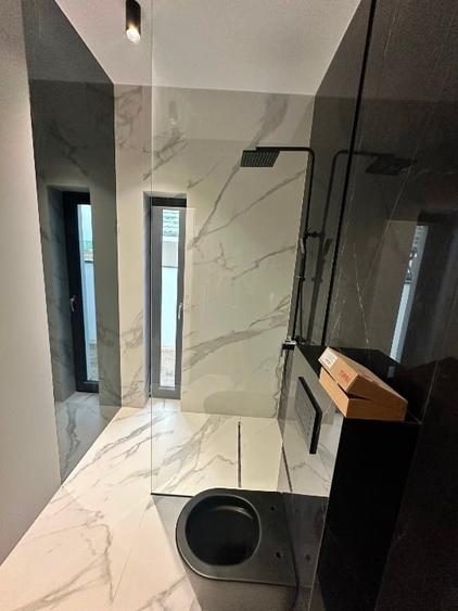 Casă individuală cu 4 camere cu Teren 390 Mp în Tunari