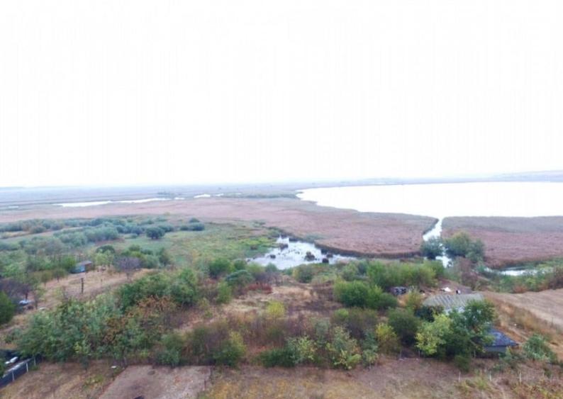 TEREN INTRAVILAN -SOMOVA ,VEDERE PANORAMICA LAC,4800 MP - 1