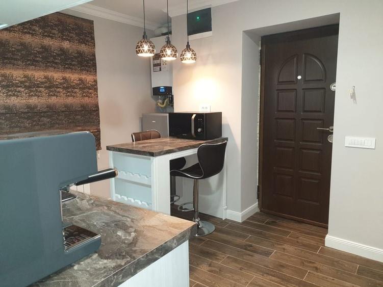 Garsoniera superfinisata si mobilata lux - langa str. Sforii - 53