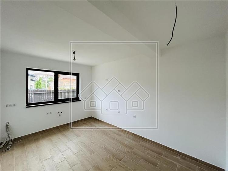 Casa de vanzare in Sibiu - 121 mp utili + 247 mp teren - 4