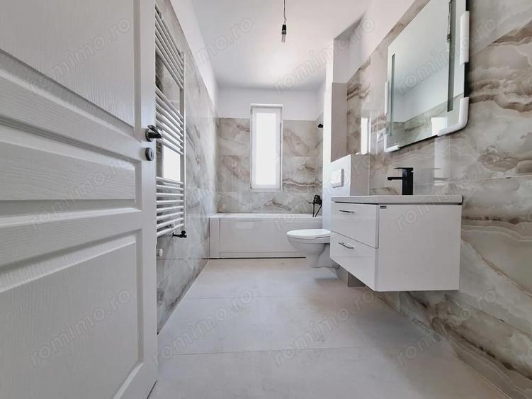 Bloc nou. Etajul 1. Bucatarie inchisa. Decomandat. - 1