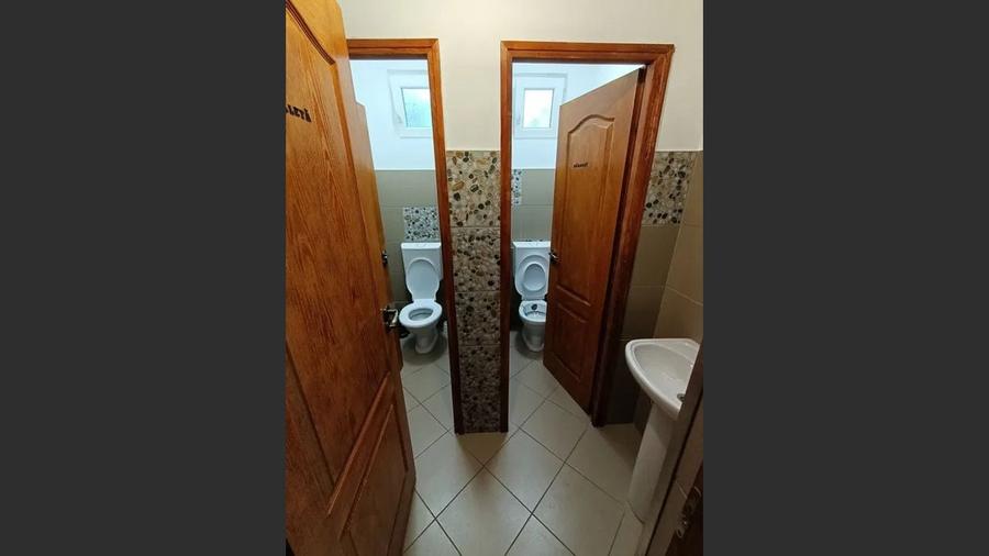 Constructie cu 3 apartamente + teren+ 2 spatii comerciale - 11