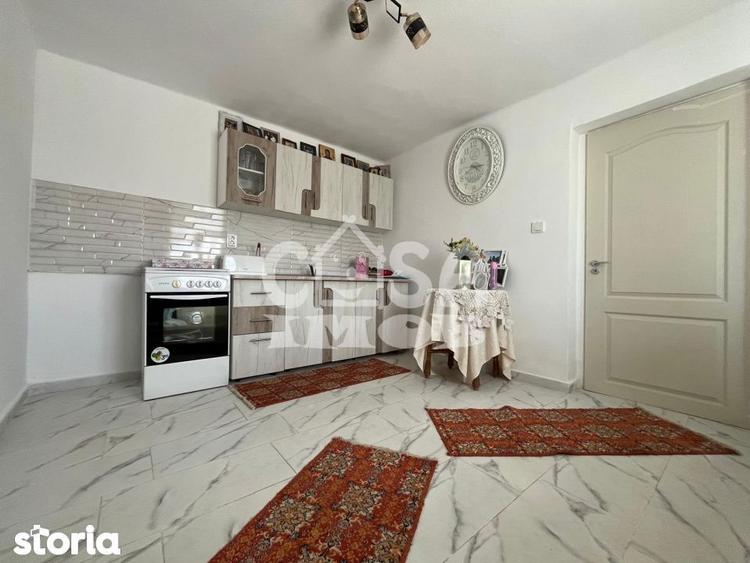 Casa parter + anexa renovata cu teren la strada - 11