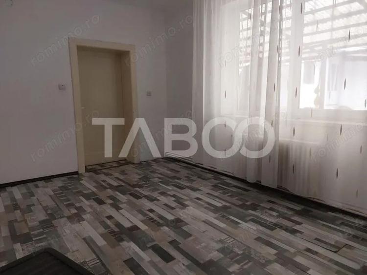 Casa 214 mp utili singur in curte 800 mp teren zona centrala Cisnadie - 11