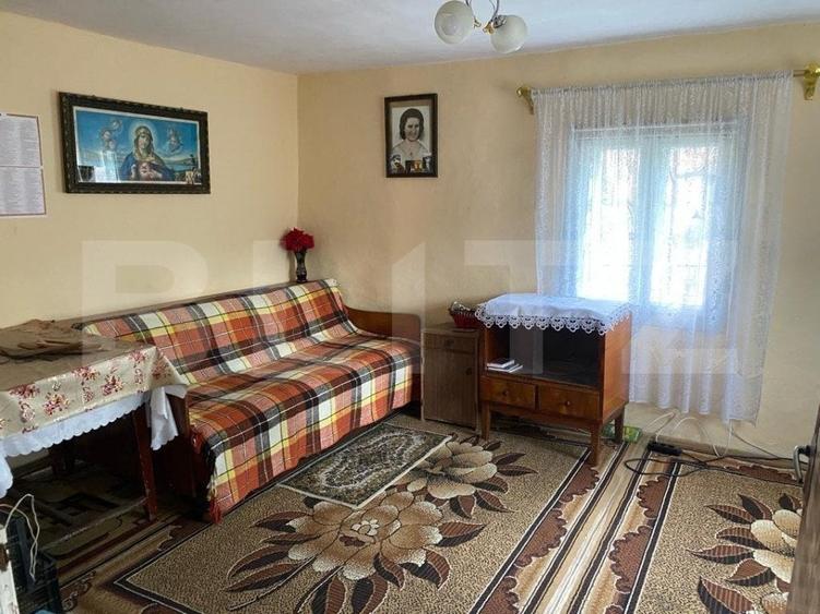Casă individuală cu 3 camere cu Teren 1048 Mp în Siret