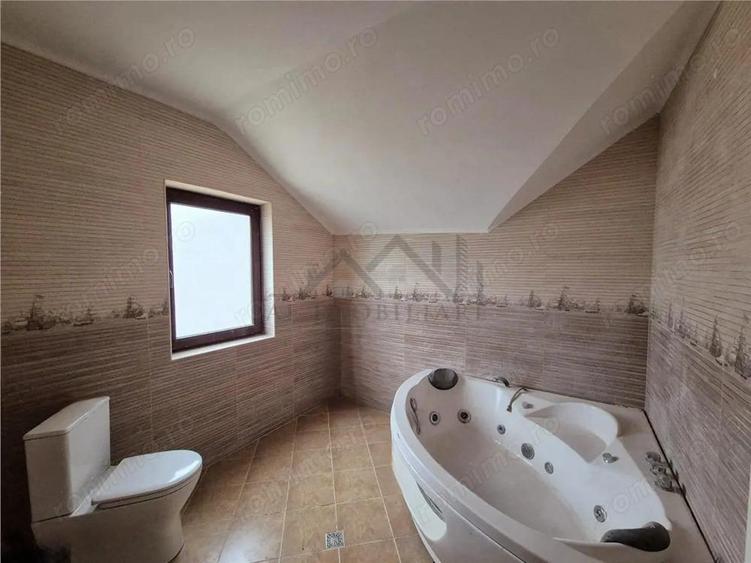 Casa de vanzare individuala cu garaj in Bucium - 17