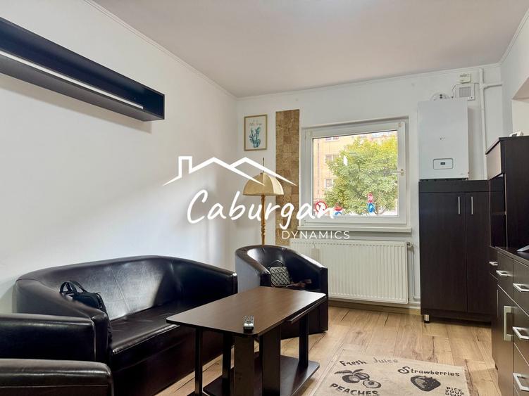 Apartament cu 3 camere semidecomandat, mobilat în Central