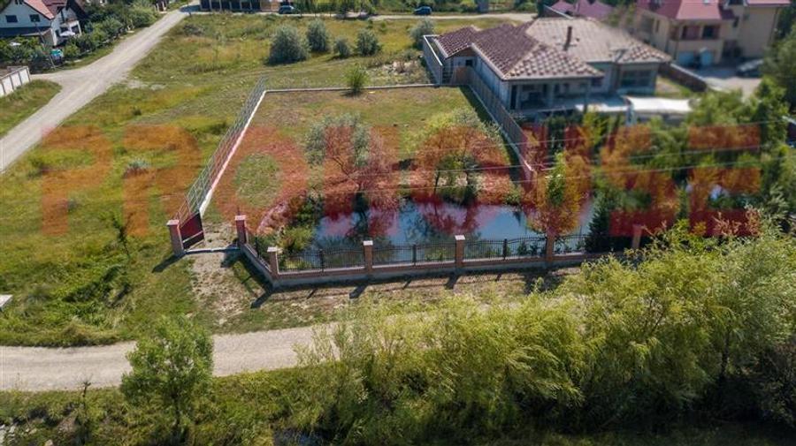 Persoana fizica - teren 1.000mp - Serbanesti - cu lac amenajat - 10