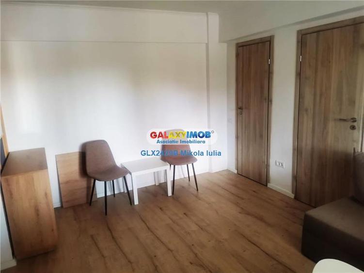 Apartament cu 3 camere semidecomandat, mobilat în Central
