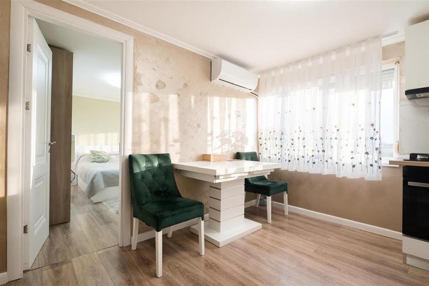 Apartament cu 2 camere decomandat în Sânmartin