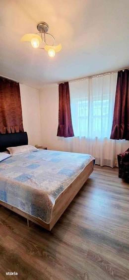 Casă cu 4 camere în Traian