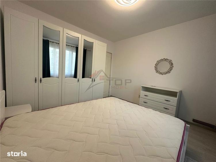 Apartament cu 2 camere semidecomandat, mobilat în Podu Roș