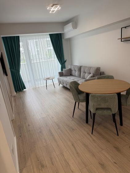 Apartament cu 2 camere semidecomandat, mobilat în Central