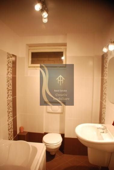 Apartament cu 3 camere semidecomandat în Dorobanți
