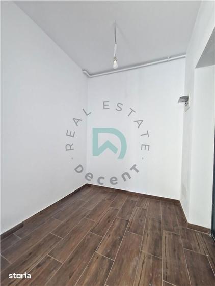 Apartament cu 3 camere decomandat în Tractorul