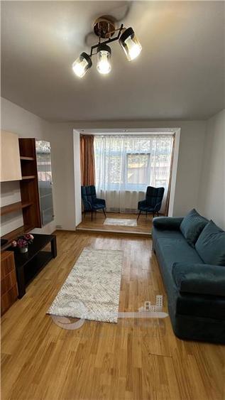 Apartament cu 2 camere semidecomandat, mobilat în Podu Roș