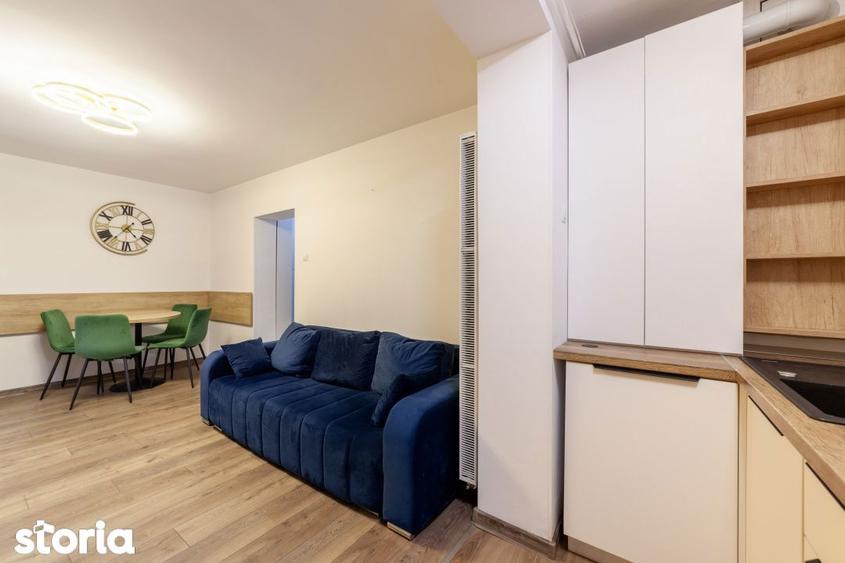 Apartament cu 3 camere semidecomandat, mobilat în Calea București