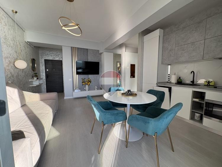 Apartament cu 2 camere semidecomandat, mobilat în Central