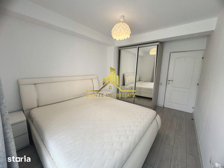 Apartament cu 3 camere semidecomandat, mobilat în Borhanci