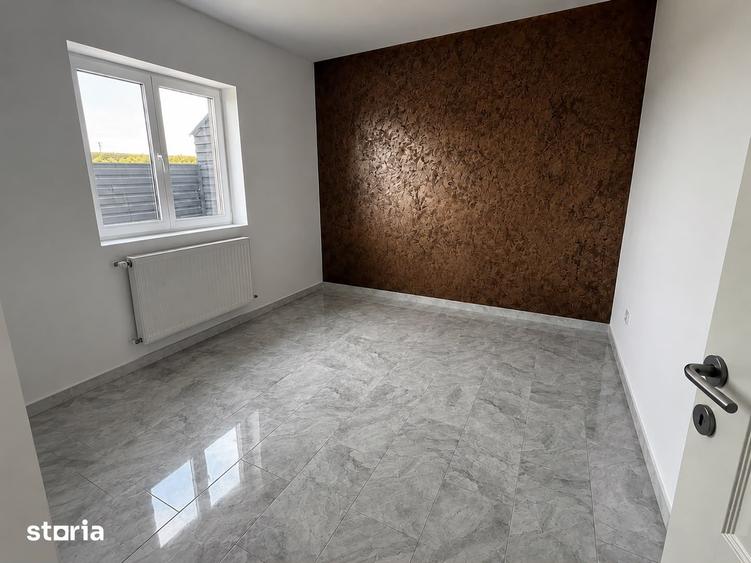 Casă cu 3 camere cu Teren 100 Mp în Holboca