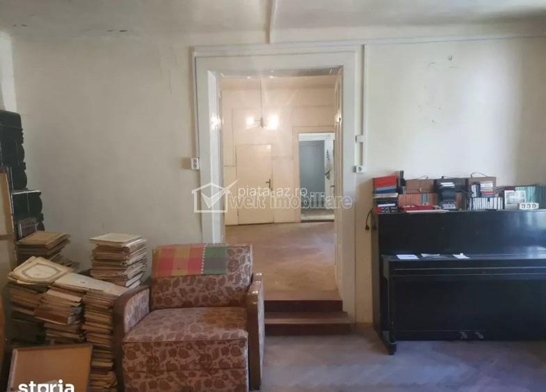 Oportunitate investitie- Casa renovabila, 2 camere, curte comuna, Centru