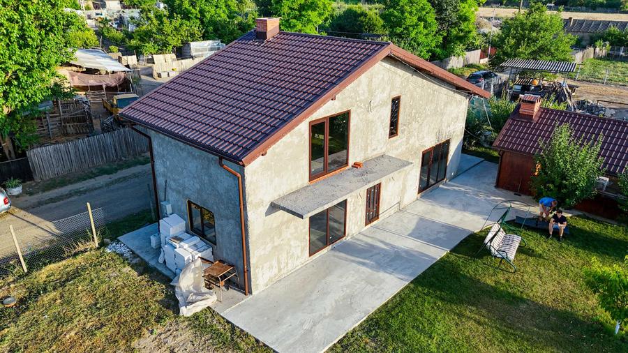 Casă cu 4 camere în Traian