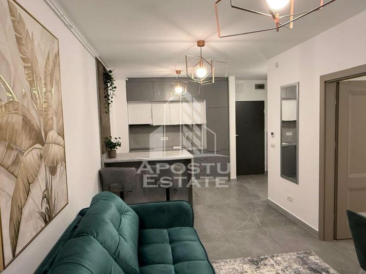Apartament cu 2 camere semidecomandat, mobilat în UTA