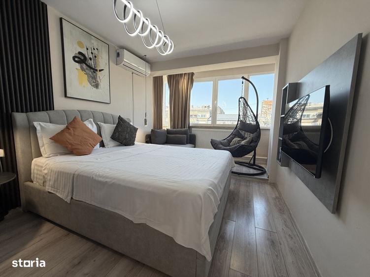 Unicat in Piata Romana! 2 camere, 53 mp, renovat integral cu designer - 11