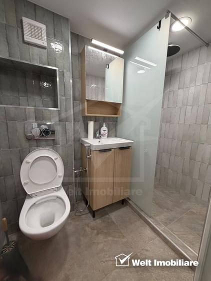 Apartament cu 2 camere semidecomandat, mobilat în Central
