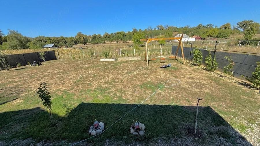 Casă cu Teren 1000 Mp în Central