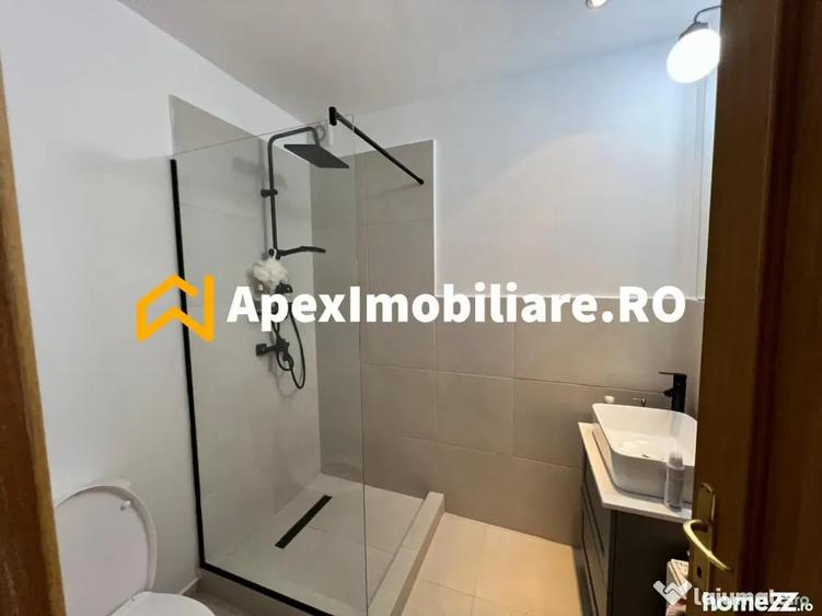 Apartament cu 3 camere semidecomandat, mobilat în Universitate