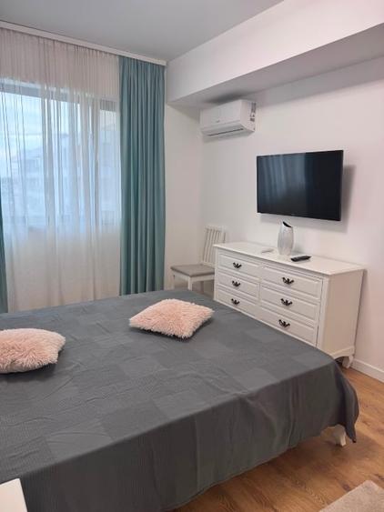 Apartament cu 2 camere semidecomandat, mobilat în Central