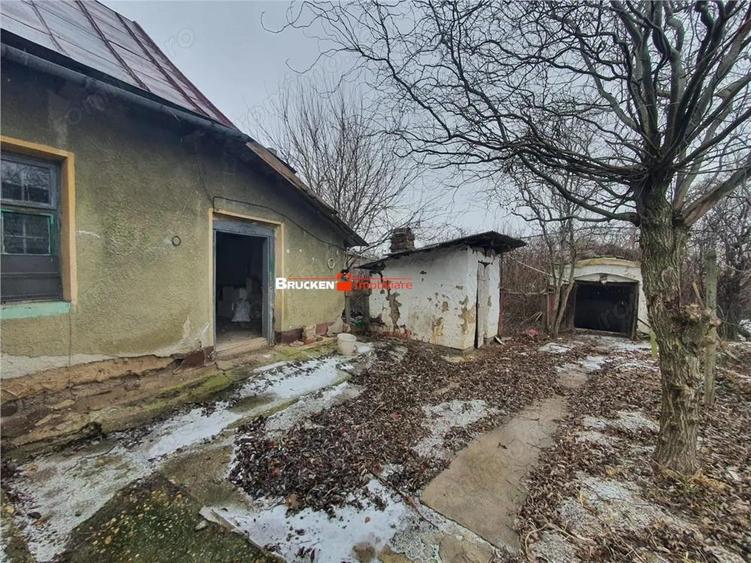 Casă cu Teren 9504 Mp în Poclușa de Barcău