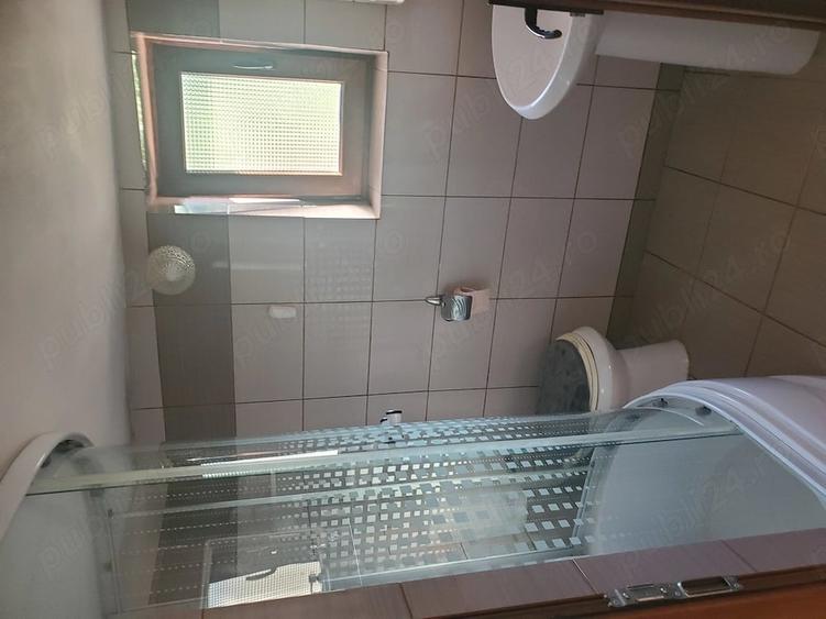 Casă cu Teren 2200 Mp în Curtișoara