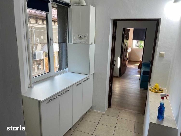 2 camere, mobilat ?i utilat complet Pia?a 1 Mai, etaj 1 in vila - 8