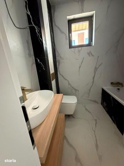 Casă cu 4 camere cu Teren 300 Mp în Central