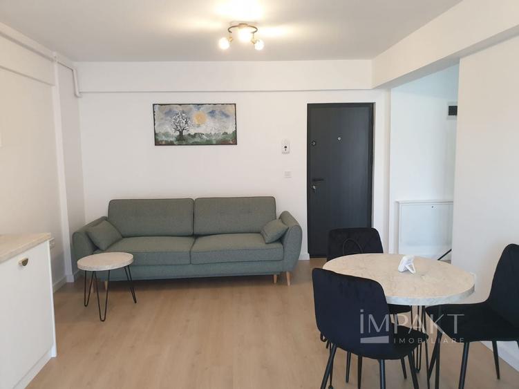 Apartament cu 2 camere semidecomandat, mobilat în Baciu
