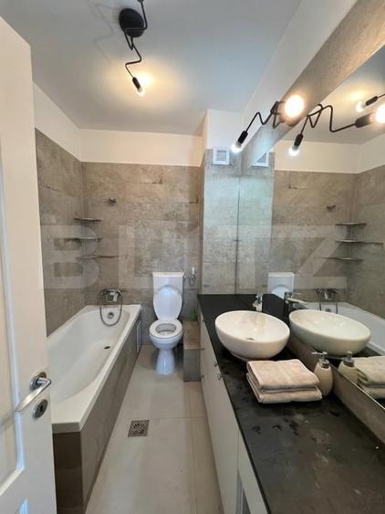 Apartament cu 2 camere semidecomandat, mobilat în Baciu