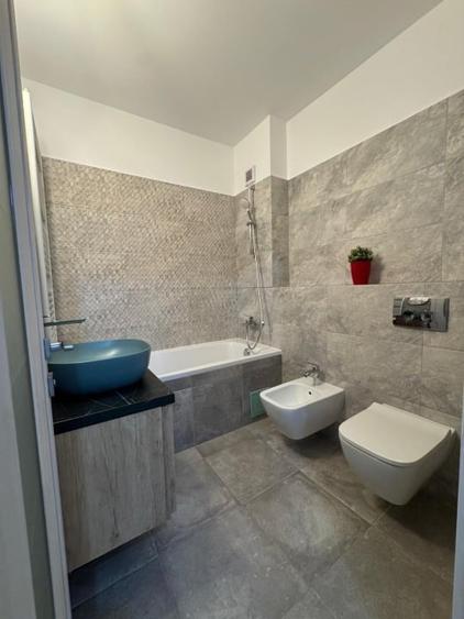 Apartament in bloc nou Fratii Golesti,terasa spectaculoasa,parcare subterana - 12