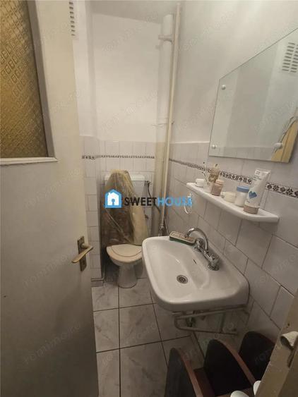 Apartament cu trei camere in zona centrala - 10