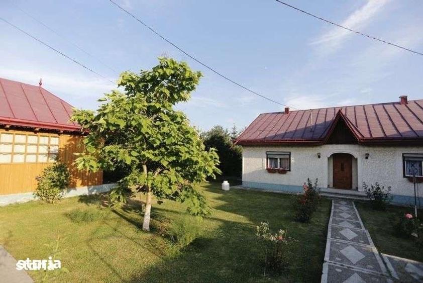 Casă cu 4 camere cu Teren 1400 Mp în Răucești
