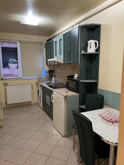 Apartament 2 dormitoare cu hol locuibil, 2 balc, centrala proprie, bloc solid - 23