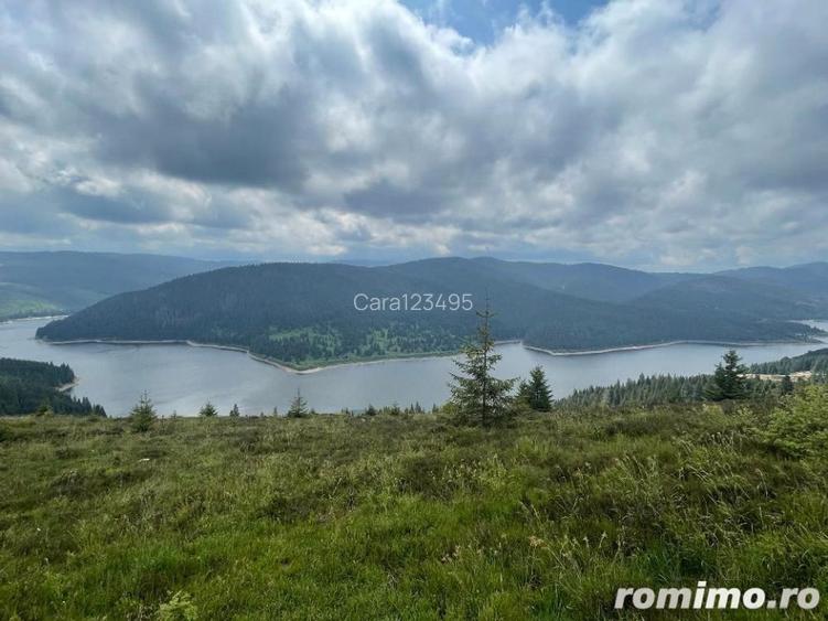 Vand sau schimb cu apartament ,teren in Belis langa lac