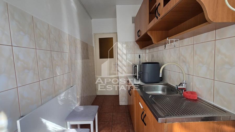 Apartament cu 2 camere, etaj intermediar, centrala proprie, zona Dacia - 12