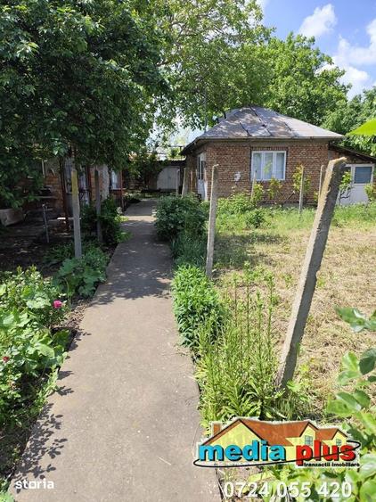 Casa cu teren 1374 mp in vatra veche a comunei Vanatori 56.000 Euro - 3