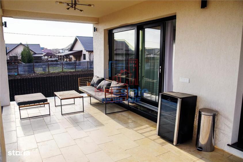 Casa intr-o zona linistita cu garaj si teren-1091 mp - 2