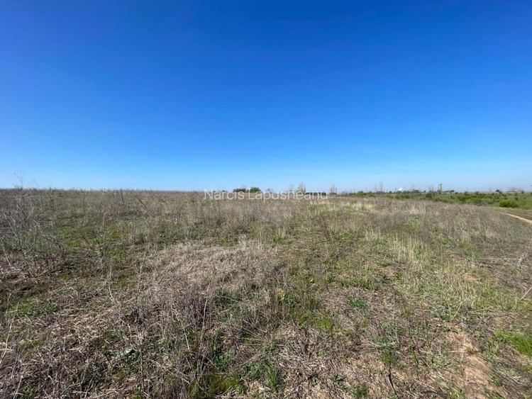 Teren intravilan 1111mp Ghercesti cu vizibilitate panoramica  la drumul expres