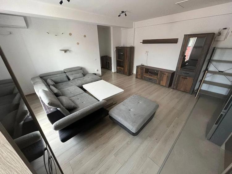 Nou. 57 mp utili. Mobilat si utilat. Asfalt. Zona Braytim - pozitie excelenta - 10