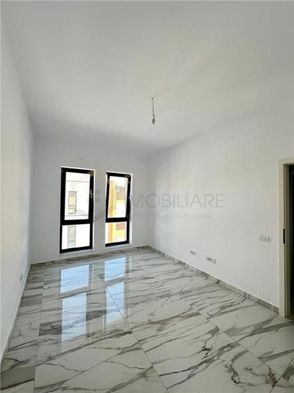 GIROC - 2 CAM - SPATIOS - PARCARE SUBTERANA - TERASA MARE - 1